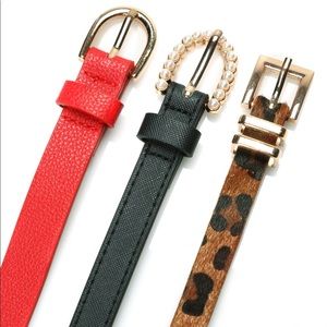 Black, red, and cheetah belts